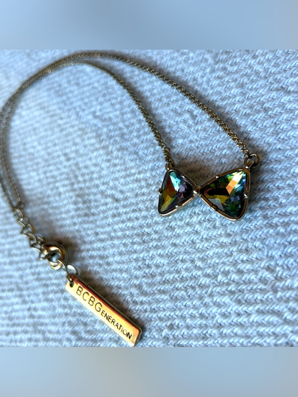 BCBGeneration Gold Holographic Vitrail Light Bow Necklace